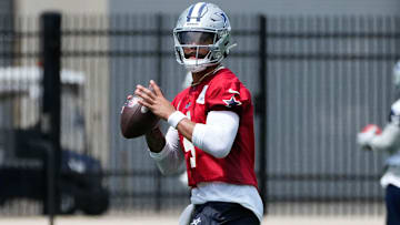 Jun 5, 2024; Frisco, TX, USA;  Dallas Cowboys quarterback Dak Prescott (4) goes through a drill during practice at the Ford Center at the Star Training Facility in Frisco, Texas. Mandatory Credit: Chris Jones-Imagn Images