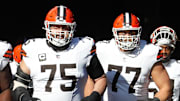 Dec 8, 2024; Pittsburgh, Pennsylvania, USA;  Cleveland Browns guards Germain Ifedi (65) and Joel Bitonio (75) and Wyatt Teller (77) take the field to play the Pittsburgh Steelers at Acrisure Stadium. Mandatory Credit: Charles LeClaire-Imagn Images