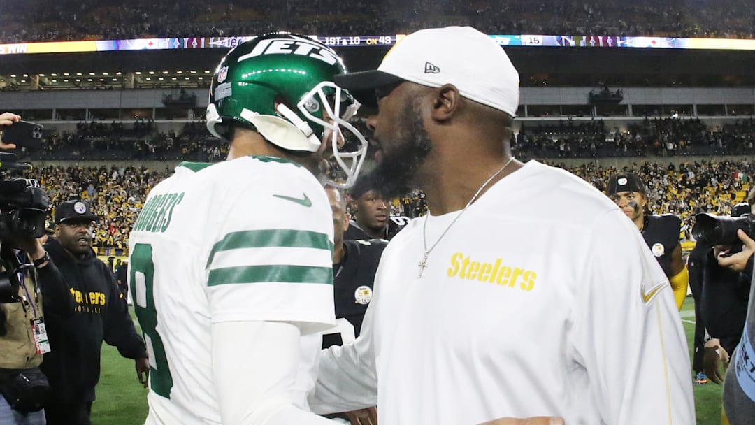 Oct 20, 2024; Pittsburgh, Pennsylvania, USA;  New York Jets quarterback Aaron Rodgers (8) and Pittsburgh Steelers head coach Mike Tomlin (right) greet each other after their game at Acrisure Stadium. Mandatory Credit: Charles LeClaire-Imagn Images