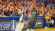 Rudy Gobert kind of attempts a three-pointer against the Golden State Warriors.