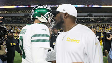 Oct 20, 2024; Pittsburgh, Pennsylvania, USA;  New York Jets quarterback Aaron Rodgers (8) and Pittsburgh Steelers head coach Mike Tomlin (right) greet each other after their game at Acrisure Stadium. Mandatory Credit: Charles LeClaire-Imagn Images