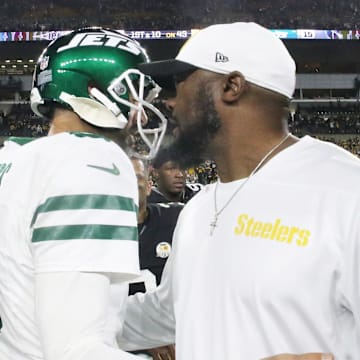 Oct 20, 2024; Pittsburgh, Pennsylvania, USA;  New York Jets quarterback Aaron Rodgers (8) and Pittsburgh Steelers head coach Mike Tomlin (right) greet each other after their game at Acrisure Stadium. Mandatory Credit: Charles LeClaire-Imagn Images