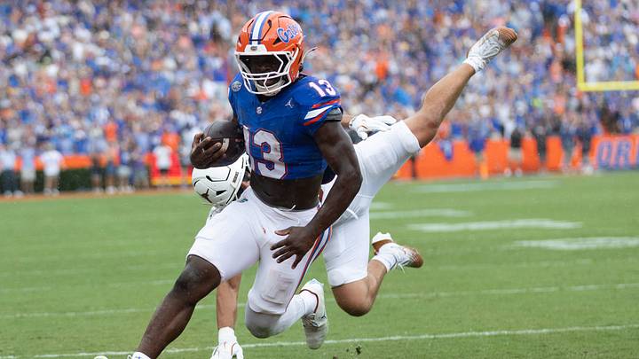 Florida running back Jadan Baugh (13) scores during the first half an NCAA football game in Gainesville, FL on Saturday, October 4, 2025. [Alan Youngblood/Gainesville Sun]