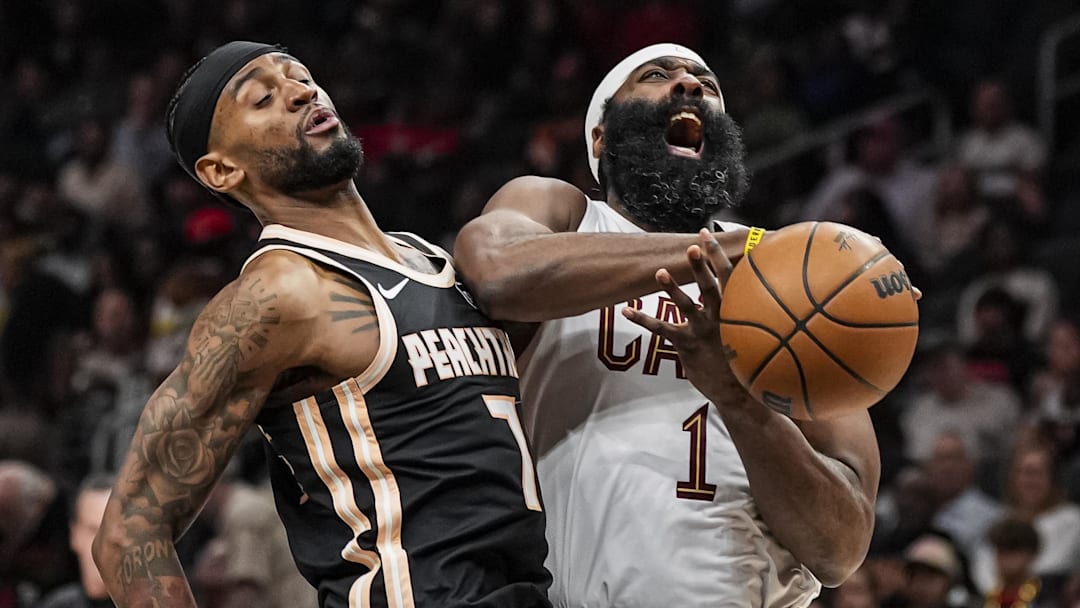 Apr 10, 2026; Atlanta, Georgia, USA; Cleveland Cavaliers guard James Harden (1) is defended by Atlanta Hawks guard Nickeil Alexander-Walker (7) during the second half at State Farm Arena. Mandatory Credit: Dale Zanine-Imagn Images