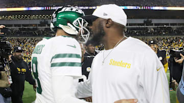 Oct 20, 2024; Pittsburgh, Pennsylvania, USA;  New York Jets quarterback Aaron Rodgers (8) and Pittsburgh Steelers head coach Mike Tomlin (right) greet each other after their game at Acrisure Stadium. Mandatory Credit: Charles LeClaire-Imagn Images