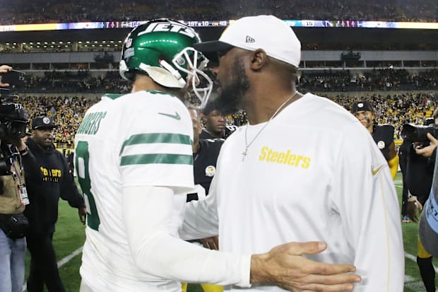 New York Jets quarterback Aaron Rodgers and Pittsburgh Steelers head coach Mike Tomlin.