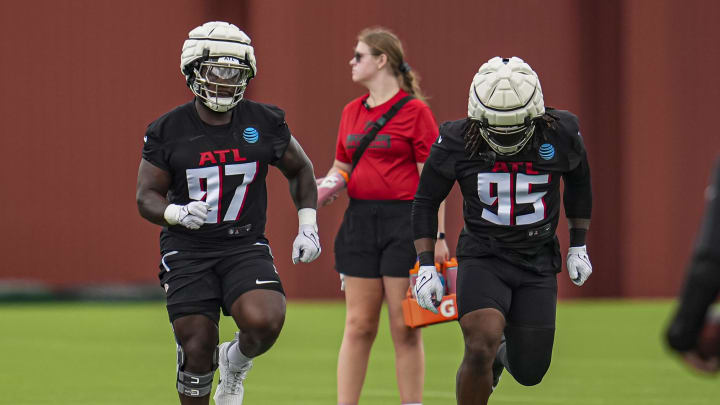 The Atlanta Falcons' defense had surprises to start training camp, but Grady Jarrett and Ta'Quon Grahem aren't among them.