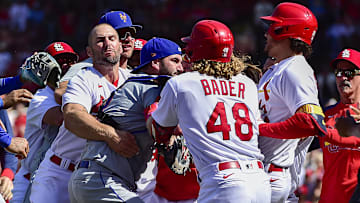 Apr 27, 2022; St. Louis, Missouri, USA;  Benches clear as St. Louis Cardinals designated hitter Nolan Arenado (28) reacts with New York Mets catcher Tomas Nido (3) and relief pitcher Yoan Lopez (44) after a high and tight pitch during the eighth inning at Busch Stadium. Arenado was ejected from the game. Mandatory Credit: Jeff Curry-Imagn Images