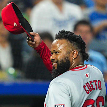 Aug 21, 2024; Kansas City, Missouri, USA; Los Angeles Angels starting pitcher Johnny Cueto (36) tips his cap to the fans as he exits the game during the seventh inning against the Kansas City Royals at Kauffman Stadium.