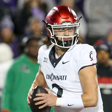 Nov 23, 2024; Manhattan, Kansas, USA; Cincinnati Bearcats quarterback Brendan Sorsby (2) drops back to pass during the first quarter against the Kansas State Wildcats at Bill Snyder Family Football Stadium. Mandatory Credit: Scott Sewell-Imagn Images