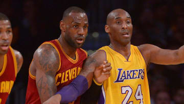 Mar 10, 2016; Los Angeles, CA, USA; Cleveland Cavaliers forward LeBron James (23) and Los Angeles Lakers forward Kobe Bryant (24) battle for position in the first quarter of the game at Staples Center. Mandatory Credit: Jayne Kamin-Oncea-USA TODAY Sports