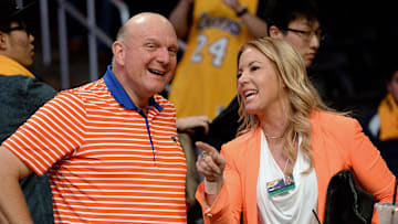 Oct 31, 2014; Los Angeles, CA, USA;  Los Angeles Clippers owner Steve Ballmer (left) talks with Los Angeles Lakers owner Jeannie Buss before the game at Staples Center. Mandatory Credit: Jayne Kamin-Oncea-Imagn Images