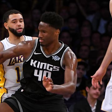 Los Angeles Lakers guard Tyler Ennis and Sacramento Kings forward Nigel Hayes-Davis.