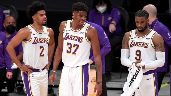 Dec 11, 2020; Los Angeles, California, USA;   Los Angeles Lakers guard Quinn Cook (2), forward Kostas Antetokounmpo (37) and guard Wesley Matthews (9) look on during a time out in the first half of the game against the Los Angeles Clippers at Staples Center. Mandatory Credit: Jayne Kamin-Oncea-USA TODAY Sports