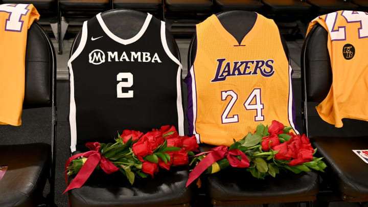 Jan 31, 2020; Los Angeles, California, USA;  Roses and the jerseys of Los Angeles Lakers Kobe Bryant, right, and his daughter Gianna are draped on the seats they sat in on the last game they attended together, Dec. 29, 2019, at Staples Center. Mandatory Credit: Jayne Kamin-Oncea-USA TODAY Sports