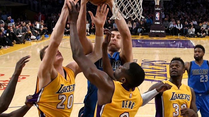 Dec 29, 2016; Los Angeles, CA, USA;  Dallas Mavericks center Andrew Bogut (6), Los Angeles Lakers center Timofey Mozgov (20) and Los Angeles Lakers forward Luol Deng (9) battle for a rebound in the first half of the game at Staples Center. Mavericks won 101-89. Mandatory Credit: Jayne Kamin-Oncea-USA TODAY Sports