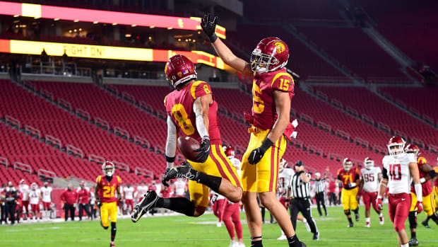 Dec 6, 2020; Los Angeles, California, USA;  USC Trojans wide receiver Amon-Ra St. Brown (8) celebrates with Drake London