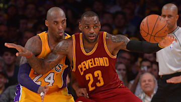 Mar 10, 2016; Los Angeles, CA, USA;  Los Angeles Lakers forward Kobe Bryant (24) guards Cleveland Cavaliers forward LeBron James (23) on the court in the first half of the game at Staples Center. Mandatory Credit: Jayne Kamin-Oncea-Imagn Images