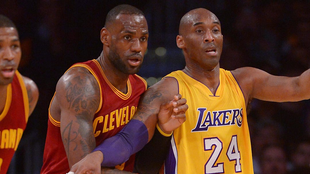 Mar 10, 2016; Los Angeles, CA, USA; Cleveland Cavaliers forward LeBron James (23) and Los Angeles Lakers forward Kobe Bryant (24) battle for position in the first quarter of the game at Staples Center. Mandatory Credit: Jayne Kamin-Oncea-Imagn Images