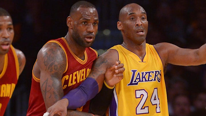 Mar 10, 2016; Los Angeles, CA, USA; Cleveland Cavaliers forward LeBron James (23) and Los Angeles Lakers forward Kobe Bryant (24) battle for position Mar 10, 2016; Los Angeles, CA, USA; Cleveland Cavaliers forward LeBron James (23) and Los Angeles Lakers forward Kobe Bryant (24) battle for position