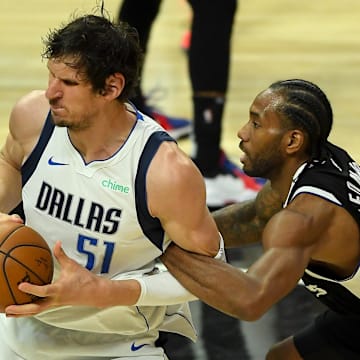 Los Angeles Clippers forward Kawhi Leonard (2) fouls Dallas Mavericks center Boban Marjanovic (51) during the second half of game 5 of round one of the 2021 NBA Playoffs at Staples Center. Mandatory Credit: Jayne Kamin-Oncea-Imagn Images