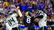 Rams linebacker Jared Verse pressures Seahawks quarterback Sam Darnold during L.A.'s win over Seattle on Sunday.