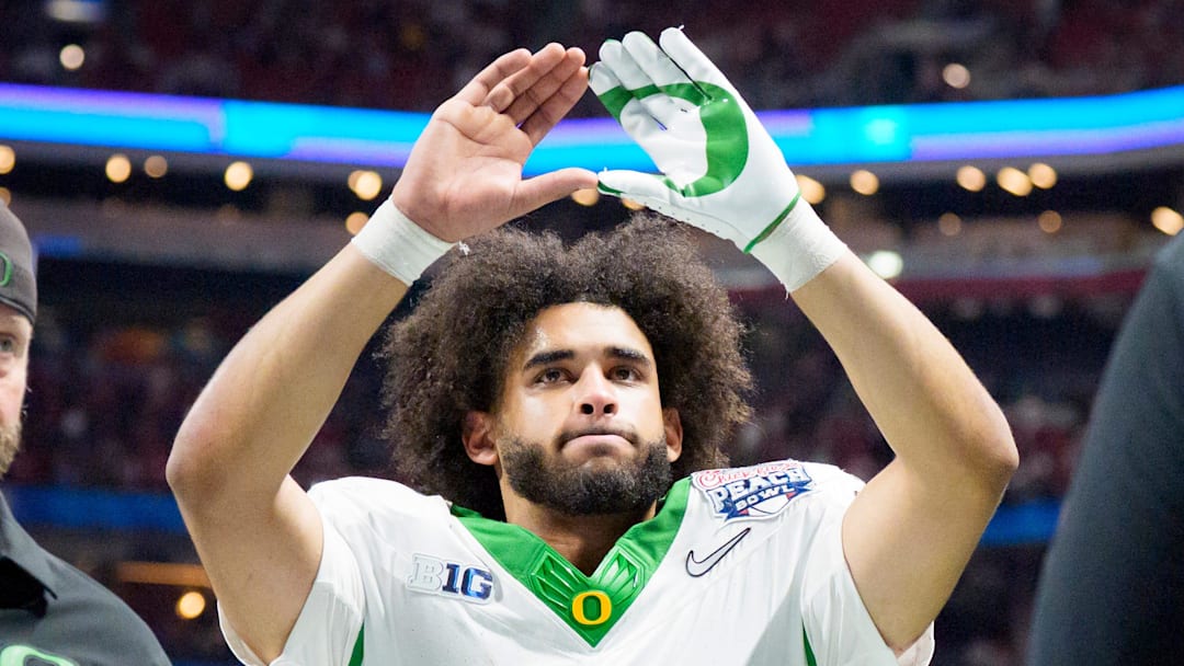 Oregon quarterback Dante Moore walks off the field as the Oregon Ducks face the Indiana Hoosiers in the Peach Bowl on Jan. 9, 2026, at Mercedes-Benz Stadium in Atlanta, Georgia.