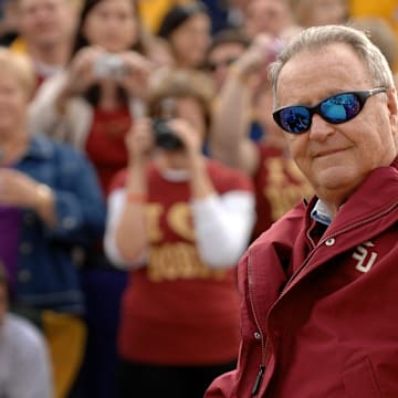 BOB SELF/The Times-Union-12/31/09--Florida State head football coach Bobby Bowden waves to fans along the parade route Thursday afternoon. Thursday afternoon the city of Jacksonville hosted the Winn-Dixie Hometown Gator Bowl Parade with Florida State head football coach Bobby Bowden serving as the Grand Marshal. The parade route was filled with Florida State University and West Virginia fans here for Friday's bowl match up.  (The Florida Times-Union, Bob Self)