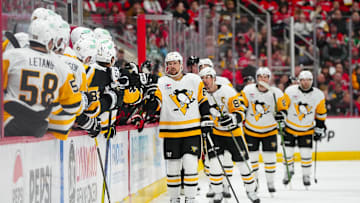 Jan 5, 2025; Raleigh, North Carolina, USA;  Pittsburgh Penguins defenseman Erik Karlsson (65) celebrates his goal against the Carolina Hurricanes during the third period at Lenovo Center. Mandatory Credit: James Guillory-Imagn Images