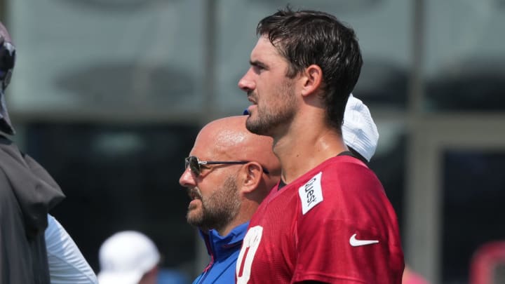 East Rutherford, NJ -- August 1, 2024 -- Head coach Brian Daboll and quarterback Daniel Jones during practice today at the New York Giants' training camp.