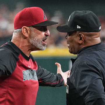 Arizona Diamondbacks manager Torey Lovullo (17) argues with first base umpire Laz Diaz (63) during the seventh inning after being thrown out of the game against the Baltimore Orioles at Chase Field.