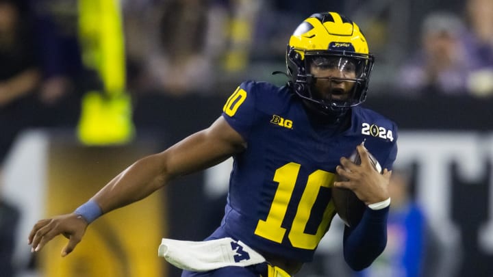 Jan 8, 2024; Houston, TX, USA; Michigan Wolverines quarterback Alex Orji (10) against the Washington Huskies during the 2024 College Football Playoff national championship game at NRG Stadium. Mandatory Credit: Mark J. Rebilas-USA TODAY Sports