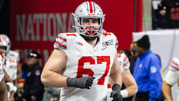 Jan 20, 2025; Atlanta, GA, USA; Ohio State Buckeyes offensive lineman Austin Siereveld (67) against the Notre Dame Fighting Irish during the CFP National Championship college football game at Mercedes-Benz Stadium. Mandatory Credit: Mark J. Rebilas-Imagn Images