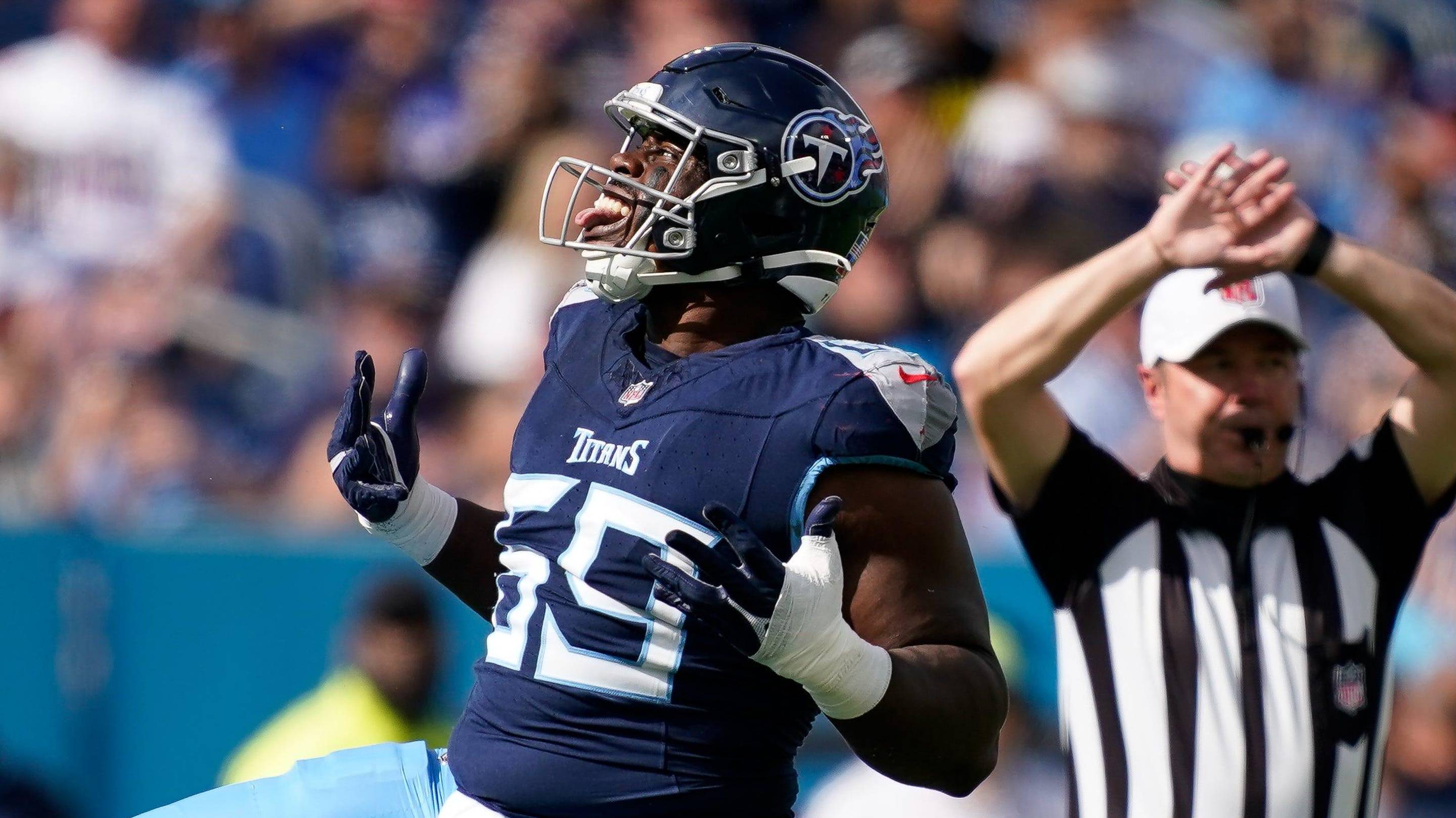 Tennessee Titans defensive tackle Sebastian Joseph-Day (69) celebrates sacking New England Patriots quarterback Drake Maye during the first quarter at Nissan Stadium in Nashville, Tenn., Sunday, Nov. 3, 2024.