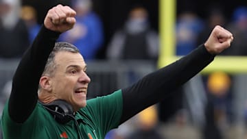 Nov 29, 2025; Pittsburgh, Pennsylvania, USA;  Miami Hurricanes head coach Mario Cristobal reacts after a touchdown against the Pittsburgh Panthers during the third quarter at Acrisure Stadium. 