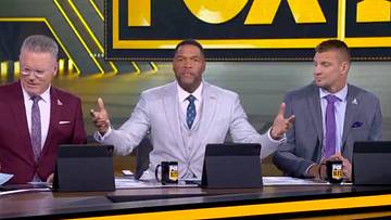 Strahan Slams Controversial Penalty, Honors Veteran with Suit