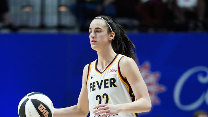 Jun 10, 2024; Uncasville, Connecticut, USA; Indiana Fever guard Caitlin Clark (22) returns the ball against the Connecticut Sun in the second half at Mohegan Sun Arena. Mandatory Credit: David Butler II-USA TODAY Sports