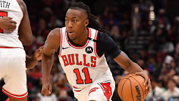 Feb 28, 2025; Chicago, Illinois, USA; Chicago Bulls guard Ayo Dosunmu (11) drives towards the basket during a game against the Toronto Raptors at the United Center. Mandatory Credit: Patrick Gorski-Imagn Images
