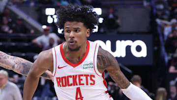 Apr 11, 2024; Salt Lake City, Utah, USA; Houston Rockets guard Jalen Green (4) dribbles past Utah Jazz forward Luka Samanic (19) during the third quarter at Delta Center. Mandatory Credit: Rob Gray-Imagn Images