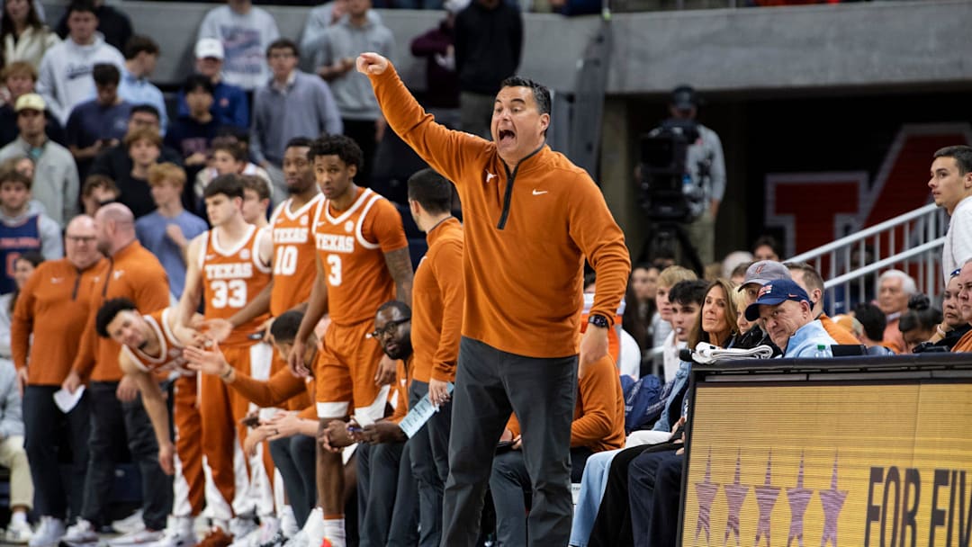 Texas Longhorns head coach Sean Miller talks with his team as Auburn Tigers take on Texas Longhorns at Neville Arena in Auburn, Ala. on Wednesday, Jan. 28, 2026. Texas Longhorns leads Auburn Tigers 42-34.