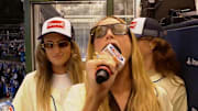 Call Her Daddy's Alex Cooper singing 'Take Me Out to the Ball Game' at Wrigley Field. 