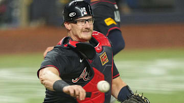 Atlanta Braves catcher Sean Murphy (12) throws out Miami Marlins right fielder Jakob Marsee (87) in the fifth inning at loanDepot Park.