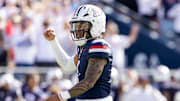 Nov 22, 2025; Tucson, Arizona, USA; Arizona Wildcats quarterback Noah Fifita (1) celebrates a touchdown against the Baylor Bears in the first half at Casino Del Sol Stadium. Mandatory Credit: Mark J. Rebilas-Imagn Images