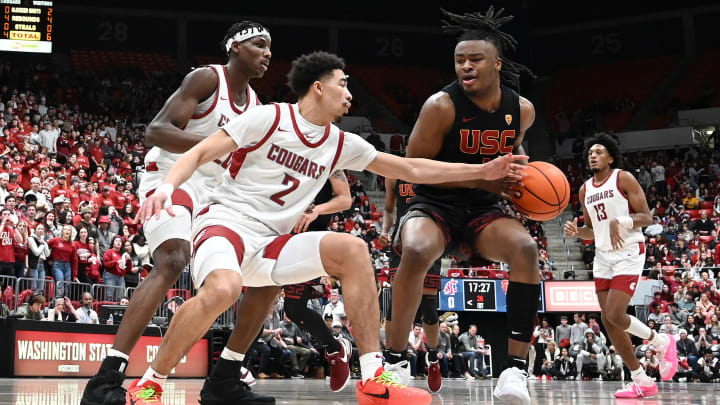 Feb 29, 2024; Pullman, Washington, USA; USC Trojans guard Isaiah Collier (1) runs the lane against Washington State Cougars guard Myles Rice (2) in the first half at Friel Court at Beasley Coliseum. Mandatory Credit: James Snook-USA TODAY Sports