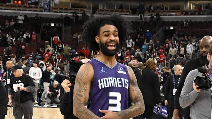 Feb 24, 2026; Chicago, Illinois, USA; Charlotte Hornets guard Coby White (3) walks toward former Chicago Bulls teammates after a game at United Center. Mandatory Credit: Matt Marton-Imagn Images
