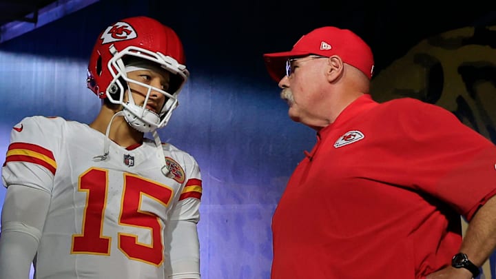 Kansas City Chiefs quarterback Patrick Mahomes (15) talks with head coach Andy Reid with tight end Travis Kelce (87) before an NFL football matchup at EverBank Stadium, Monday, Oct. 6, 2025, in Jacksonville, Fla. The Jacksonville Jaguars edged the Kansas City Chiefs 31-28. [Corey Perrine/Florida Times-Union]