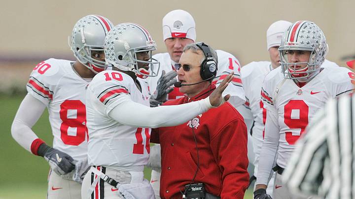 Ohio State's Troy Smith (10) and head football coach Jim Tressel on the sidelines during the first half of their game against Northwestern at Ryan Field, November 11, 2006.
