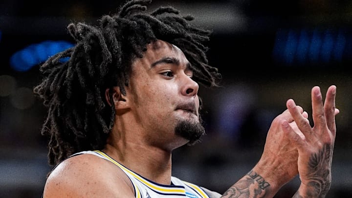 Michigan guard Elliot Cadeau (3) celebrates a 3-pointer against Alabama during the second half of NCAA Tournament Sweet 16 round at United Center in Chicago on Friday, March 27, 2026.