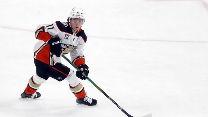 Oct 30, 2023; Pittsburgh, Pennsylvania, USA;  Anaheim Ducks center Trevor Zegras (11) handles the puck against the Pittsburgh Penguins during the second period at PPG Paints Arena. Anaheim won 4-3. Mandatory Credit: Charles LeClaire-USA TODAY Sports