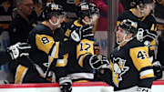 Nov 30, 2024; Pittsburgh, Pennsylvania, USA;  Pittsburgh Penguins center Blake Lizotte (46) celebrates his second goal of the game against the Calgary Flames during the third period at PPG Paints Arena. Mandatory Credit: Charles LeClaire-Imagn Images